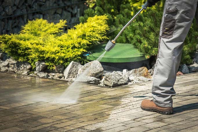 pressure washing a driveway